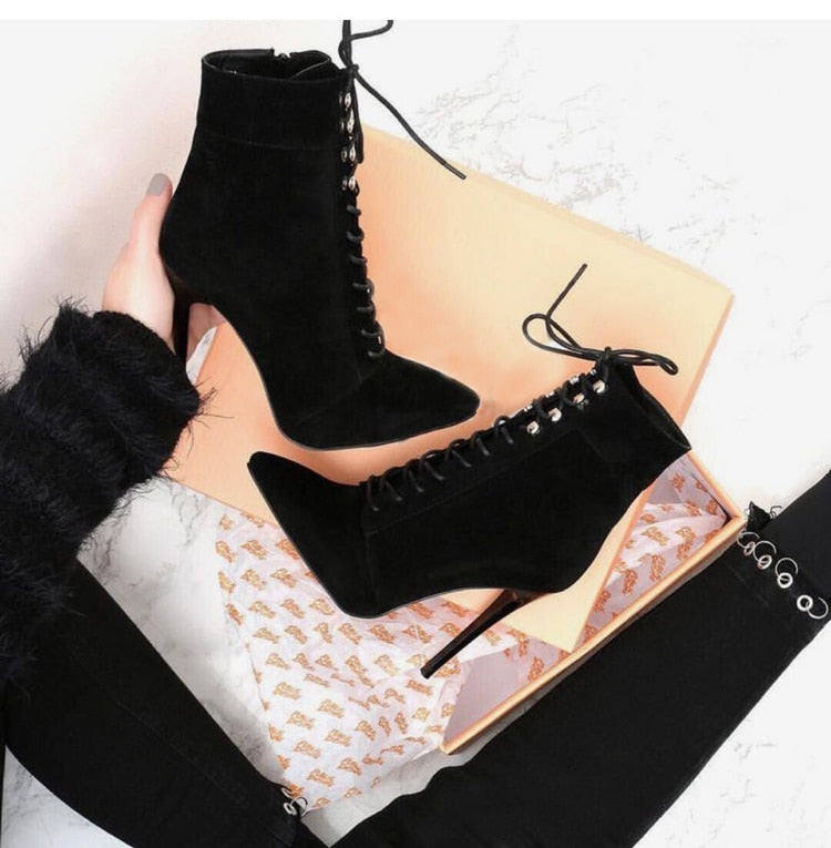 Prim- Sleek, black, above the ankle booties